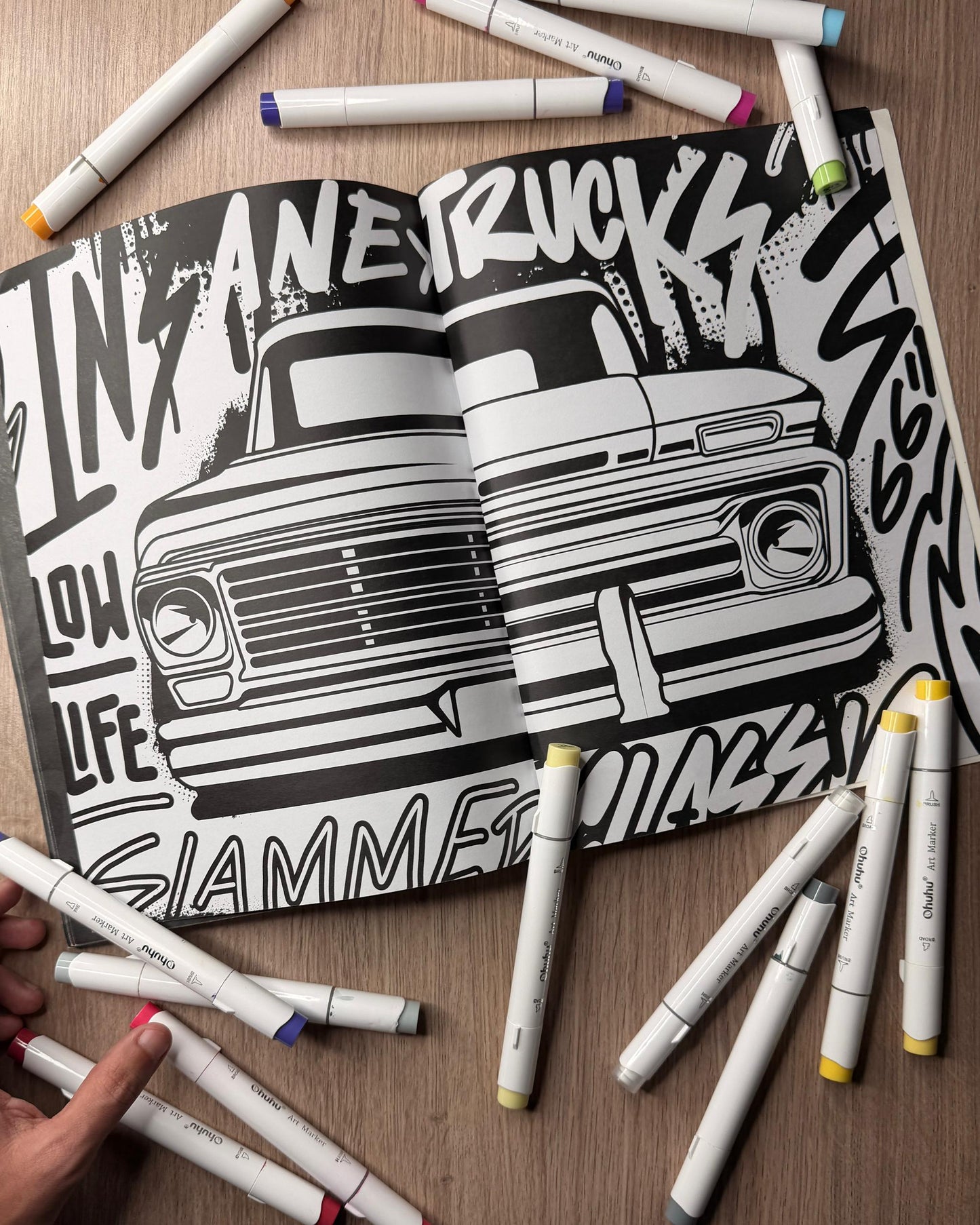 INSANE TRUCKS COLORING BOOK